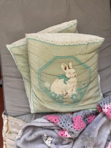 Two rabbit cushions